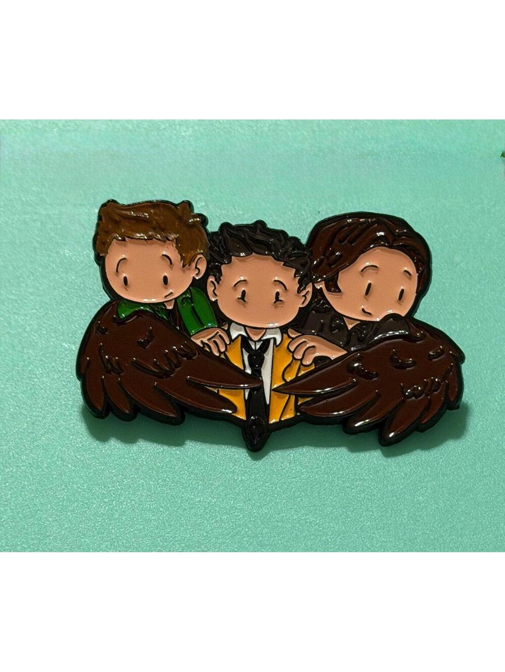 Supernatural Pin featuring Dean Winchester, Castiel and Sam Winchester.